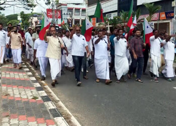 Kerala, Members of Popular Front of India (PFI) raise slogans during the one-day state-wide over the NIA raids  in Kottayam and Kochi,