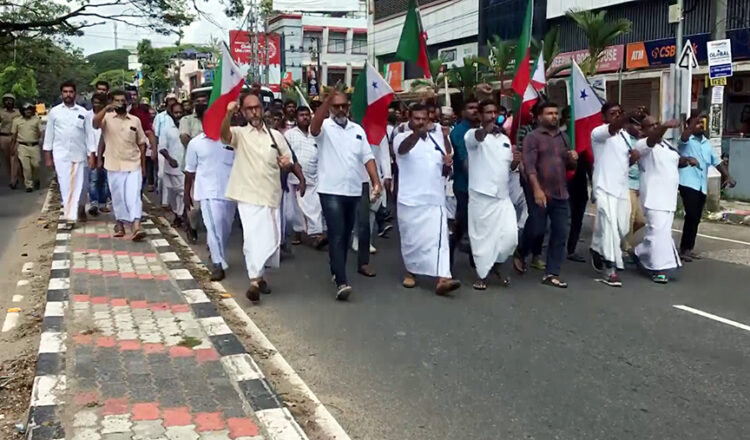 Kerala, Members of Popular Front of India (PFI) raise slogans during the one-day state-wide over the NIA raids  in Kottayam and Kochi,