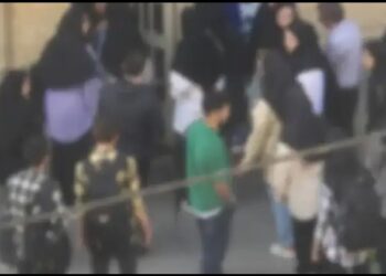 Iran student stop at the university gate for not wearing hijab