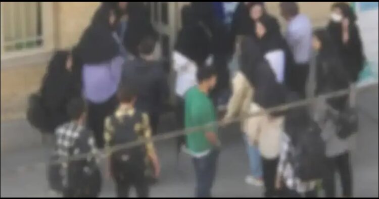 Iran student stop at the university gate for not wearing hijab