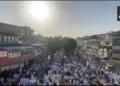 muslim offering namaz on the road on eid