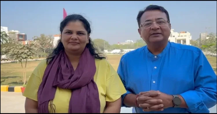 Prayagraj Mahakumbh Austrelian couple takes holy dip in Triveni