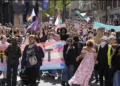 Britain Transgender protest palestinian flag