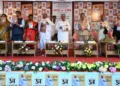 पुस्तक का लोकार्पण करते श्री दत्तात्रेय होसबाले। साथ में हैं पुस्तक के लेखक श्री अशोक भगत और अन्य अतिथि