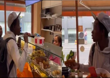 London African men eat chicken Isckon
