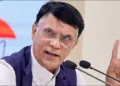 Congress Vote chori Aligation Pawan Khera Hold two Voter card
