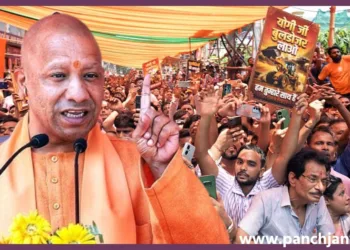 CM Yogi Adityanath Kolkata Rally Bulldozer Posters West Bengal Election