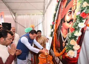 CM Pushkar Singh Dhami addressing a gathering at Nanakmatta Uttarakhand