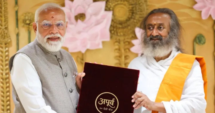 Prime Minister Narendra Modi with Spiritual leader Sri Sri Ravi Shankar during his visit to Art of Living Foundation International Centre as part of the organisation’s 45th Anniversary Celebrations, in Bengaluru on Sunday.