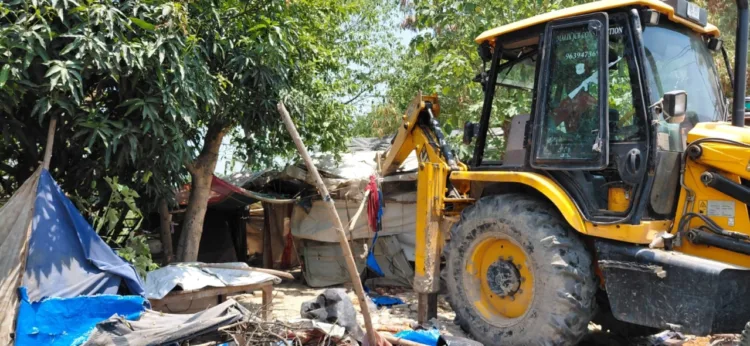 dhami government bulldozer action-against-illegal encroachment in uttarakhand