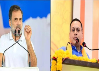 राहुल गांधी (बाएं) और अमित मालवीय