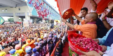 CM Yogi Showering Flowers On Kanwar Yatra Devotees Meerut Helicopter Panchjanya