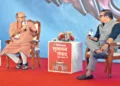 फिल्मकार डॉ. चंद्रप्रकाश द्विवेदी से संवाद करते हुए वरिष्ठ पत्रकार अनुराग पुनेठा